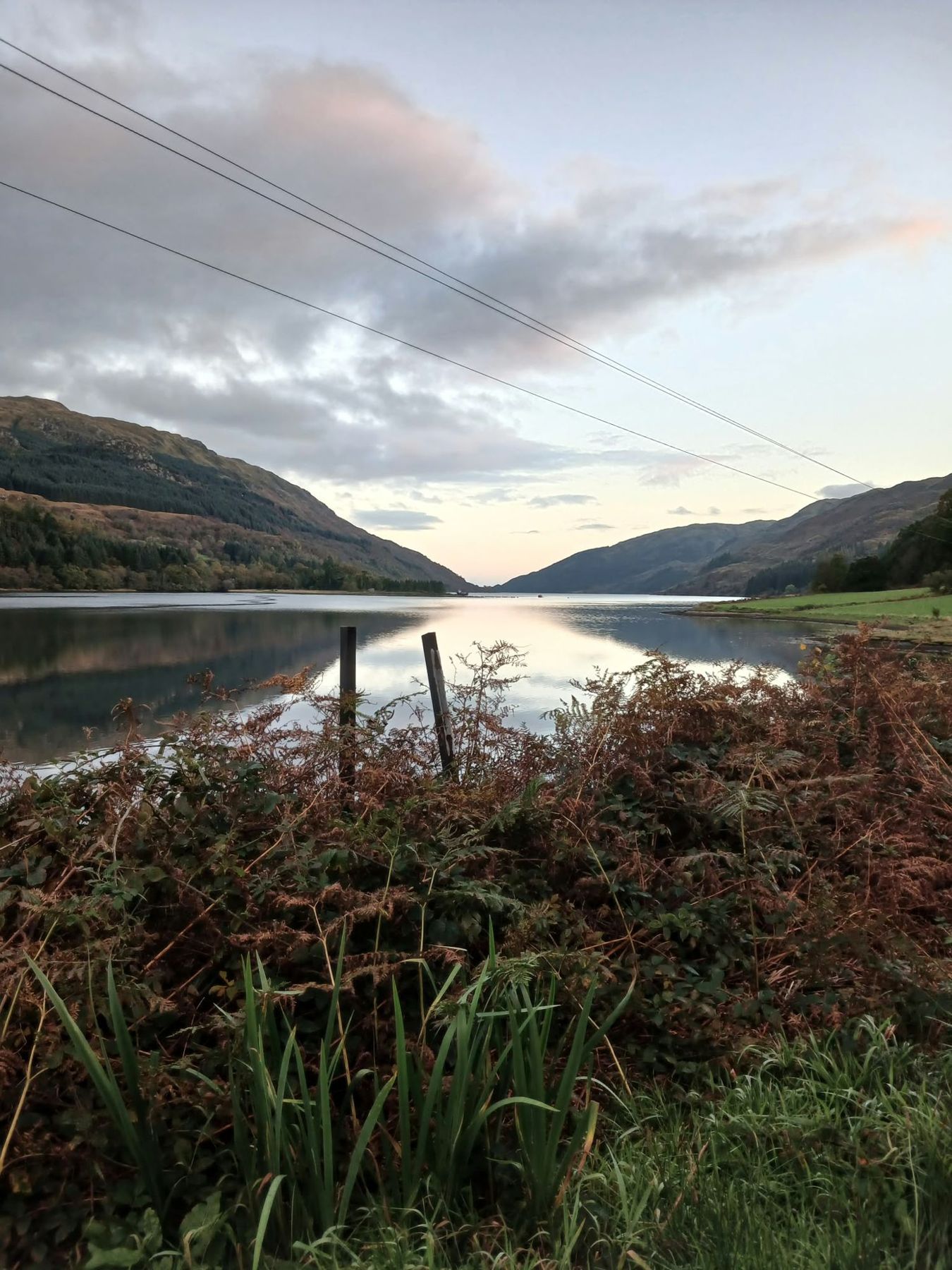 Loch and hills at sunset near Cot House